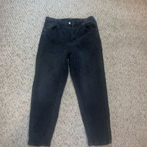 Black, straight legged jeans. NEW